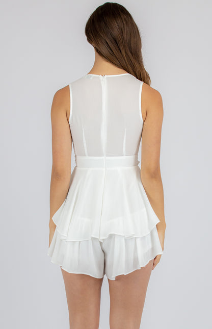 WELMA SLEEVELESS PLAYSUIT WITH RUFFLE DETAILS IN WHITE